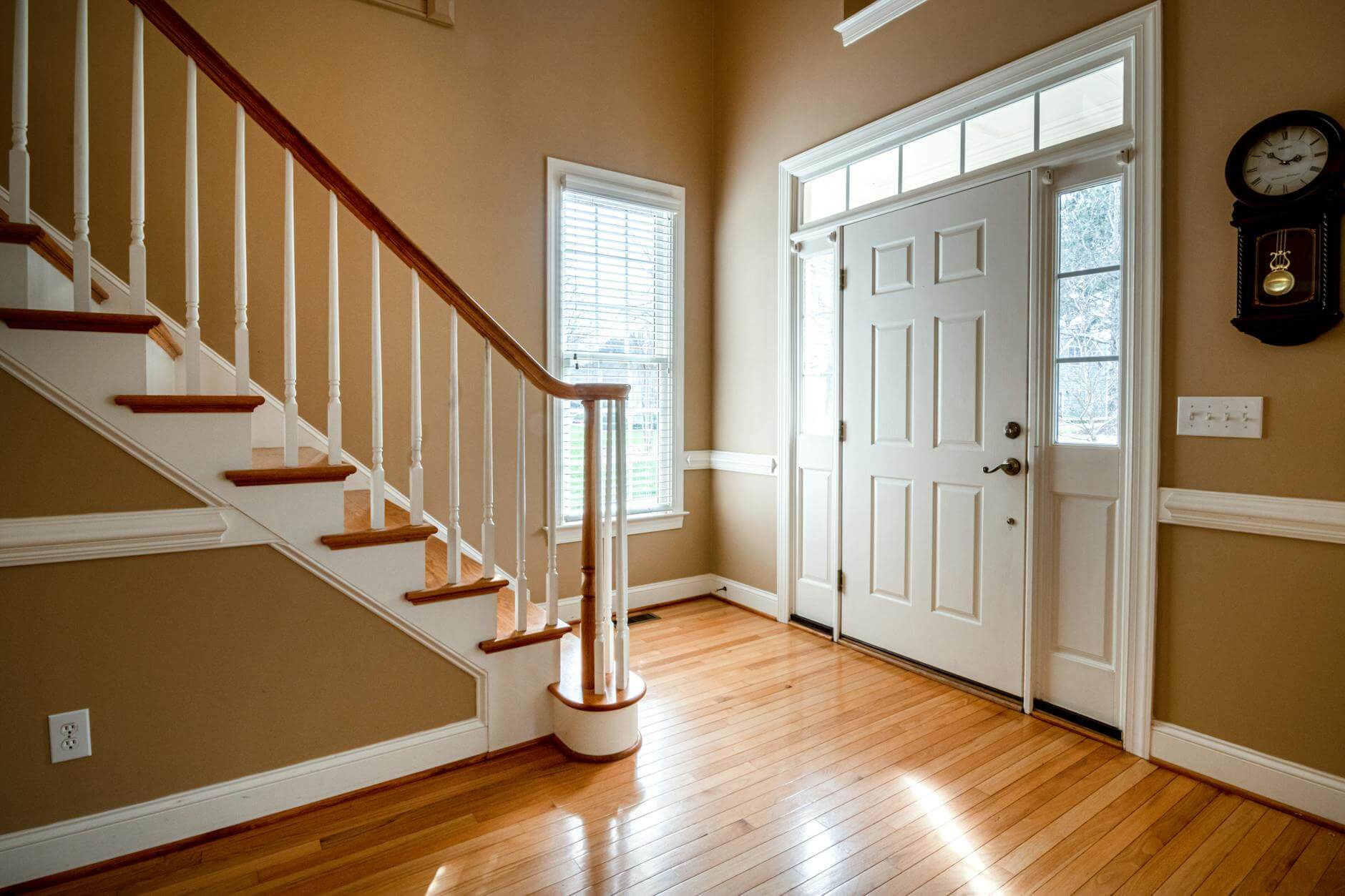 white wooden door on brown wooden parquet floor