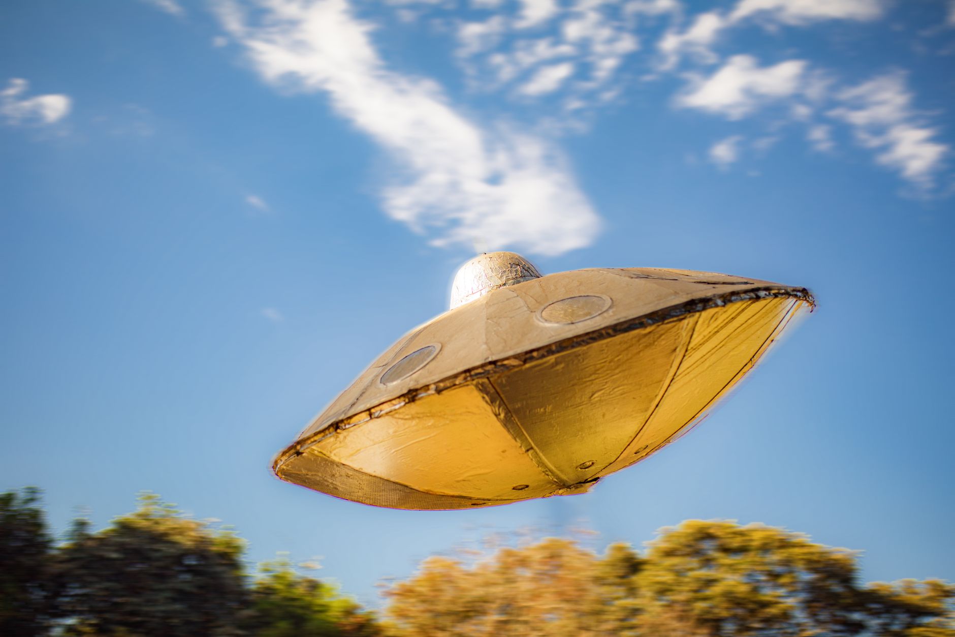 toy ufo in air